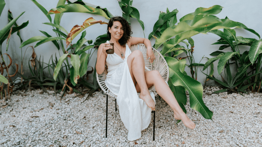 Health coach enjoying freedom after learning how to attract high-paying clients as a practitioner