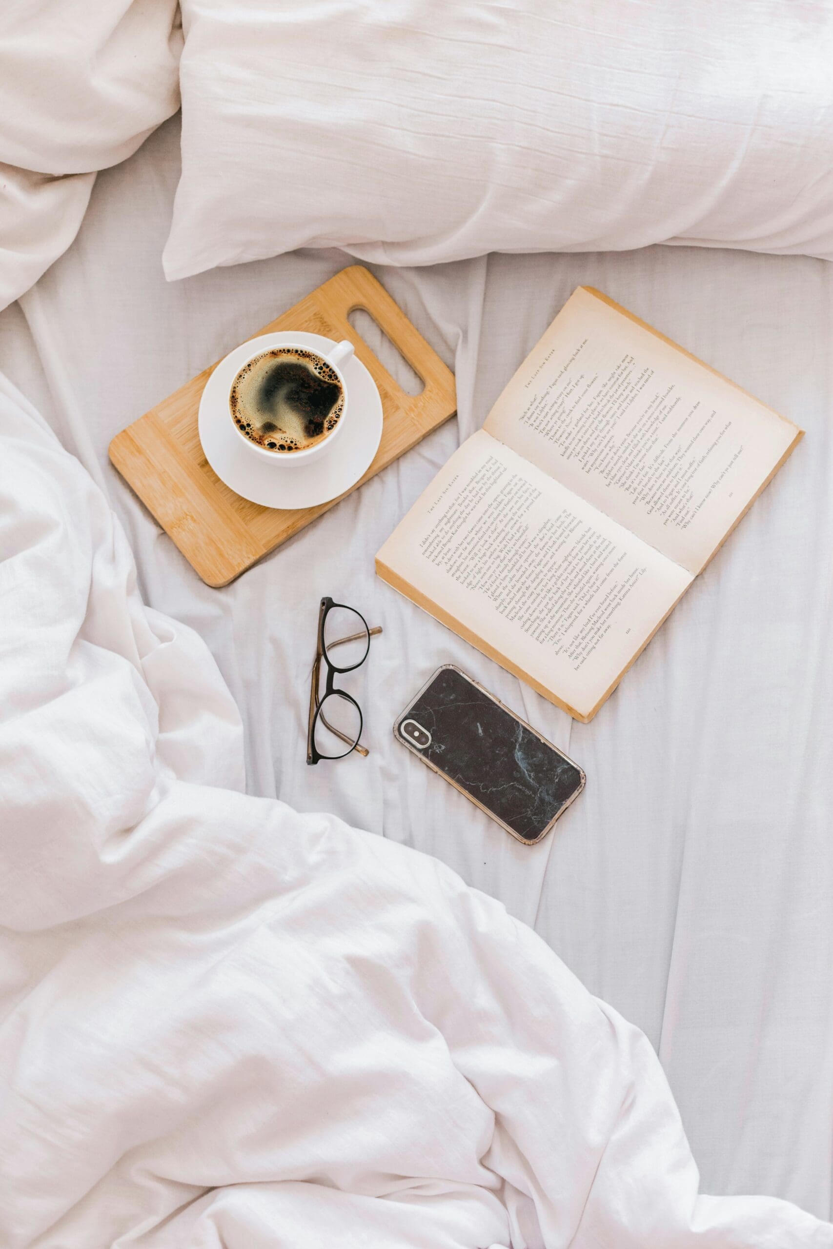 Morning routine with coffee and reading – symbolizing clarity and focus for health practitioners seeking balance.